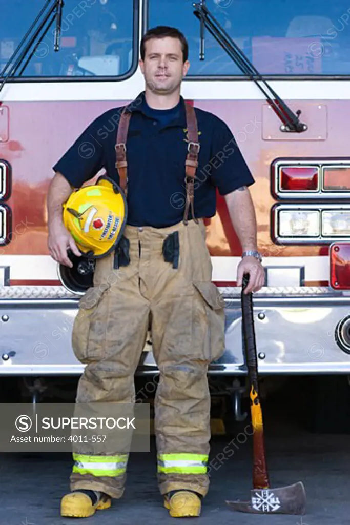 Fireman standing in front of a fire truck