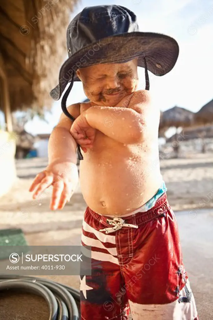 Baby boy having fun on the beach, Puerto Vallarta, Jalisco State, Mexico