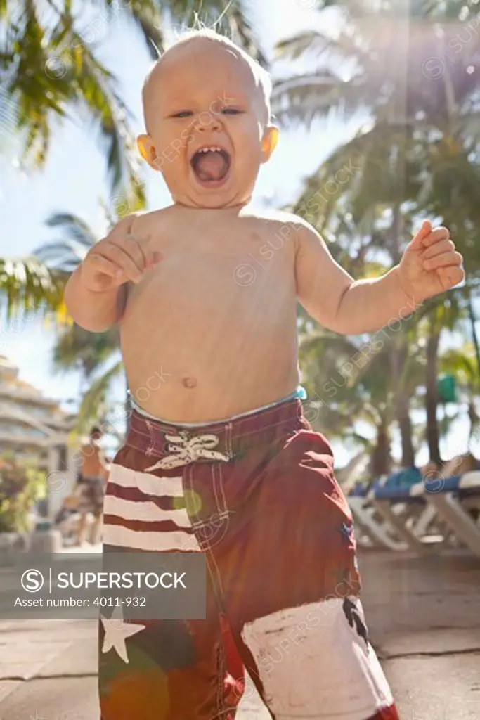 Close-up of a baby boy laughing, Puerto Vallarta, Jalisco State, Mexico