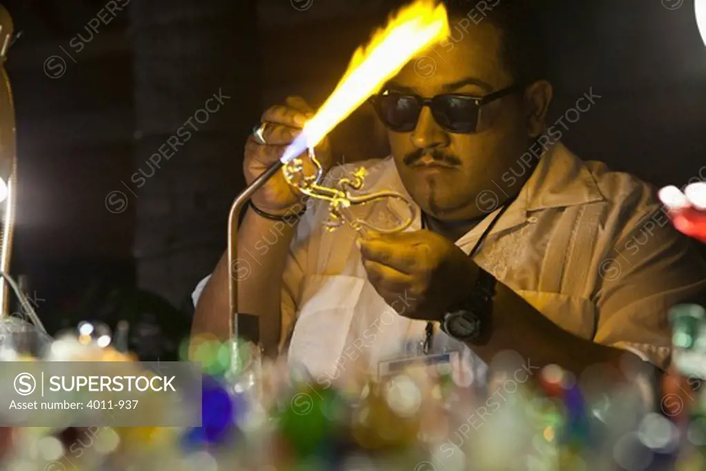 Glass Blower creating tourist trinkets, Puerto Vallarta, Mexico