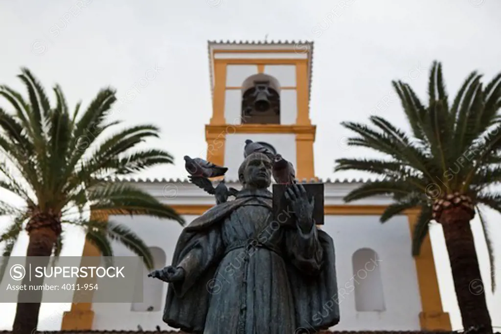 Bronze statue in front of a church on the island of Majorca, Spain