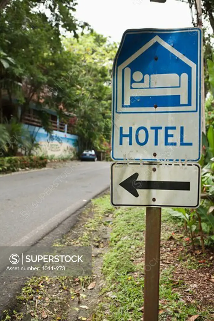Hotel sign showing vehicles where to stop, Costa Rica