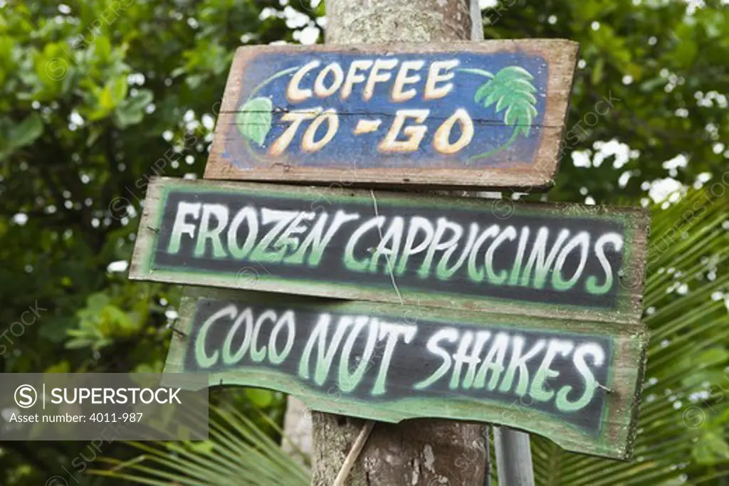 Tourist street signs for Coffee, Costa Rica