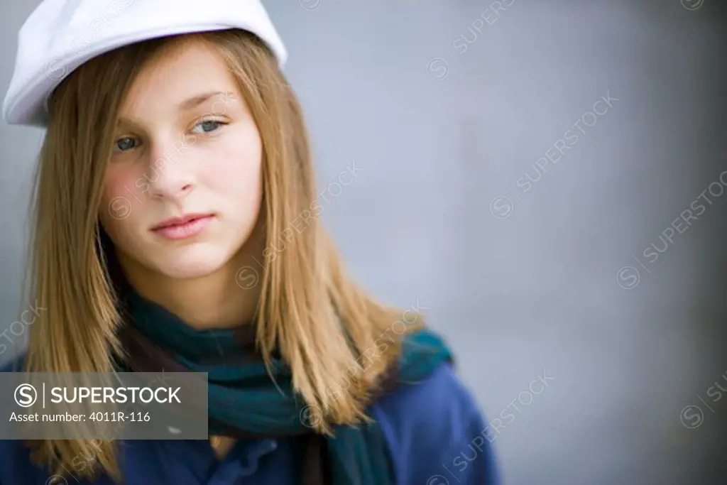 Close-up of a teenage girl thinking