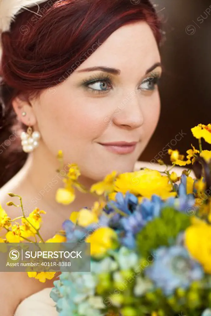 Portrait of bride holding bouquet