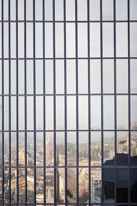 USA, California, Los Angeles, windows reflecting cityscape