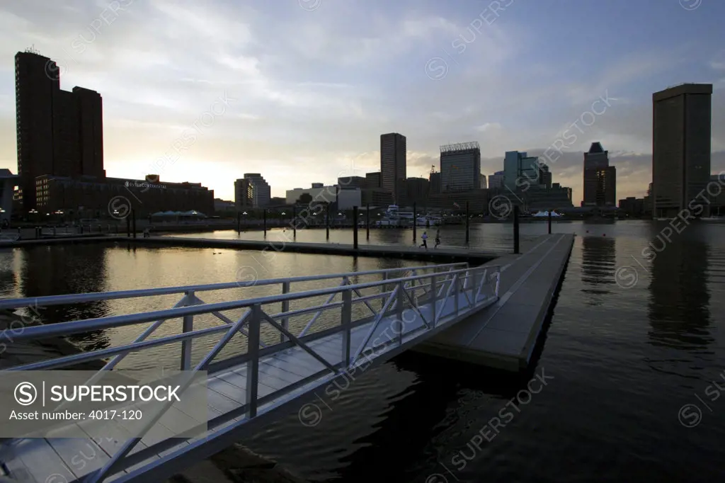USA,   Maryland,   Baltimore,   Inner Harbor,   footbridge land pier,   sunset