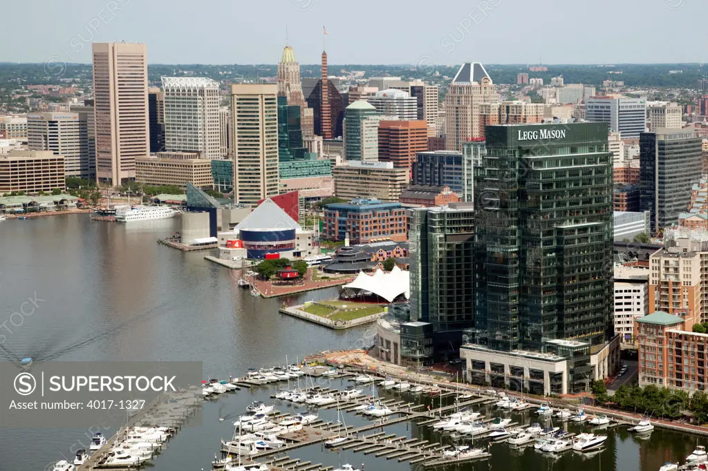 Aerial of the Harbor East and Downtown Baltimore Skyline along the Inner Harbor with a marina in the foreground