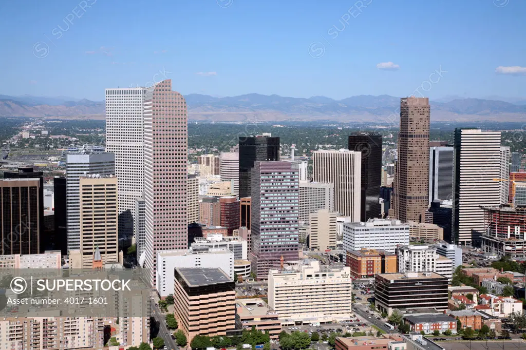 Aerial of the Downtown Denver Skyline with the Rocky mountains in the background