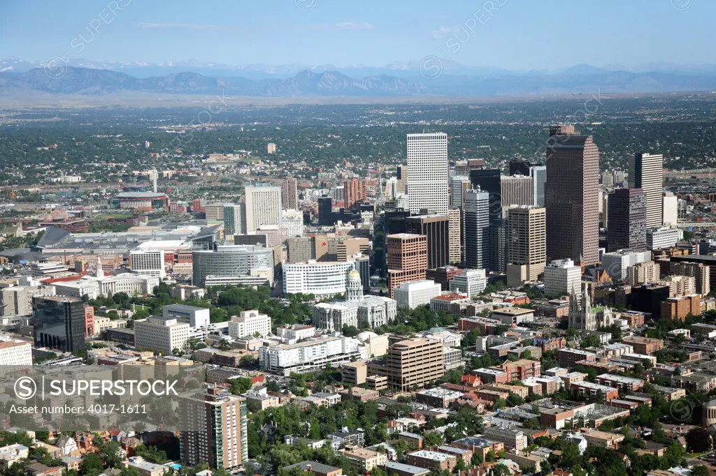 Aerial of the Capitol Hill area and the Denver Skyline with the Rockies in the Backround