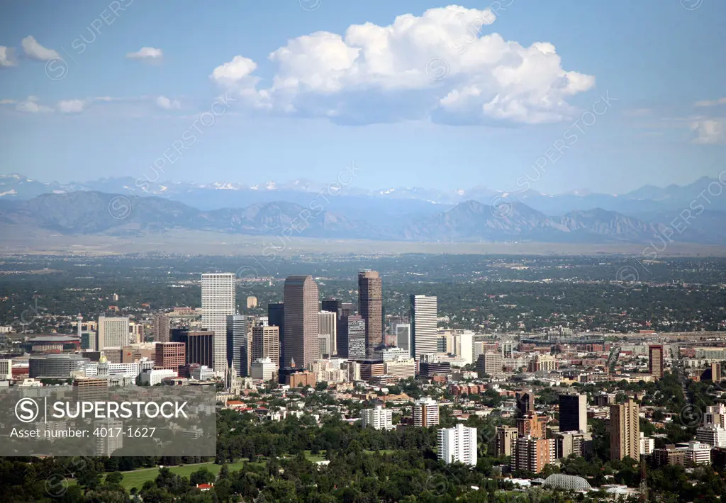 Denver Skyilne and Rocky Mountains with Cheesman Park