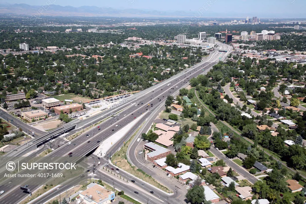 Interstate 25 and Yale Ave in Southeast Denver with Cherry Creek and Downtown Denver in distance