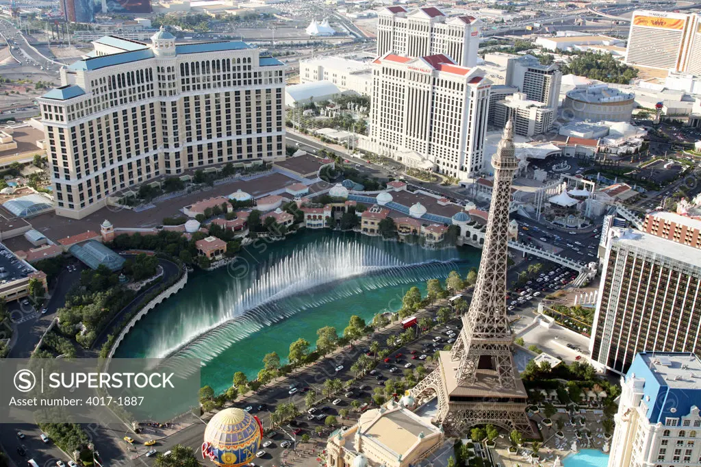 Fountains of Bellagio along the Las Vegas Strip with Paris in the foreground and Caesars Palace in the background