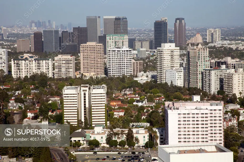 The willshire, century city and downtown skylines of Los Angeles blend together in this aerial from the west.