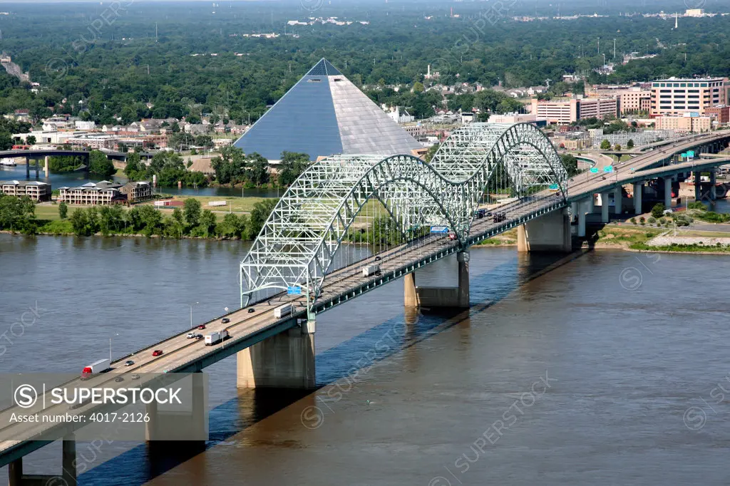 Aerial of Hernando-DeSoto Bridge from Mississippi River with Pyramid Arena in Background