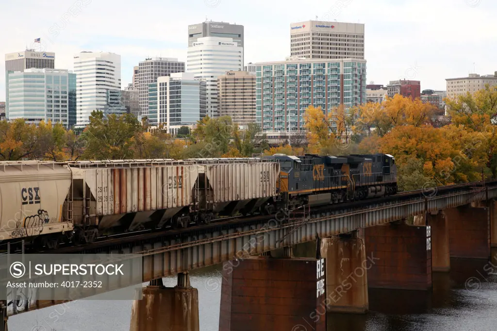 Cargo Train on Bridge over James River with Richmond Skyline in Background