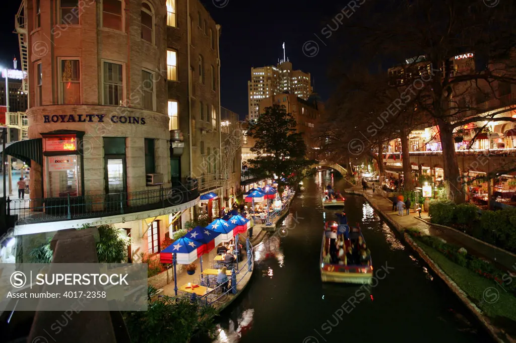 Downtown San Antonio, Texas Riverwalk with Rio San Antonio Cruises River Tour Boats on the River and Riverside Cafes