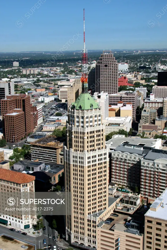 Aerial of The Tower Life Building on Villita Street with Downtown San Antonio, Texas in the Background