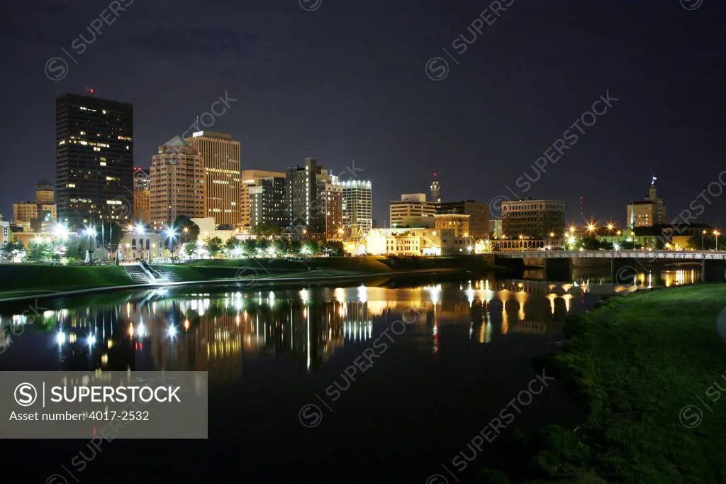 Downtown Dayton along the Great Miami River lit up at night, Ohio, USA