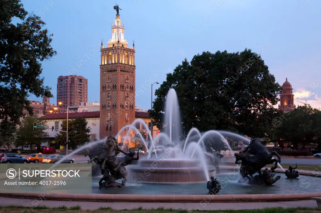 J.C. Nichols Memorial Fountain at dusk with Giralda Tower, Mill Creek Park, Country Club Plaza, Kansas City, Missouri, USA
