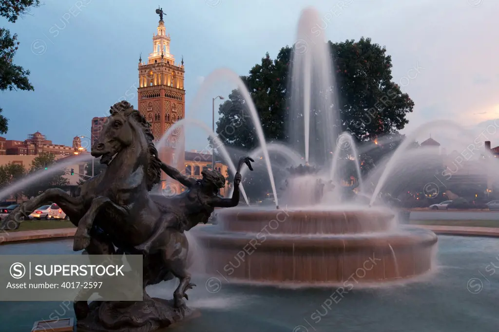 J.C. Nichols Memorial Fountain at dusk with Giralda Tower, Mill Creek Park, Country Club Plaza, Kansas City, Missouri, USA