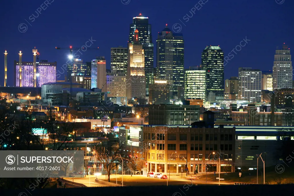 Skyscrapers lit up at night, Kansas City, Missouri, USA