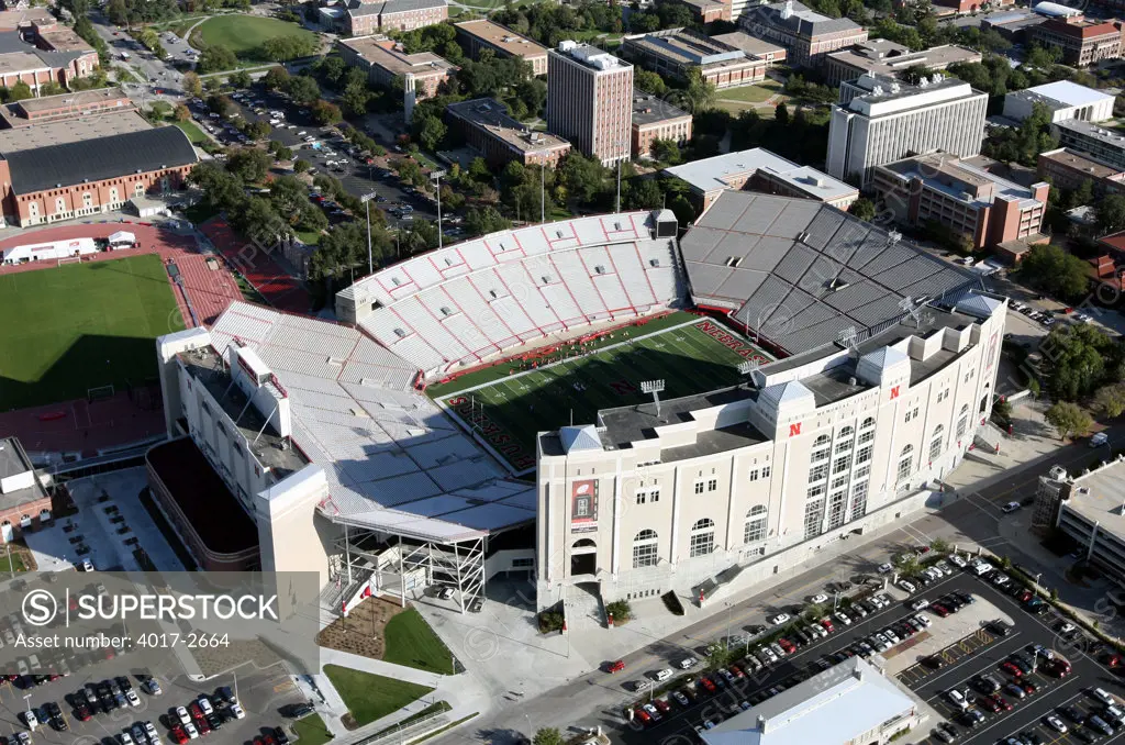 Aerial view of stadium in a city, Memorial Stadium, Lincoln, Lancaster County, Nebraska, USA