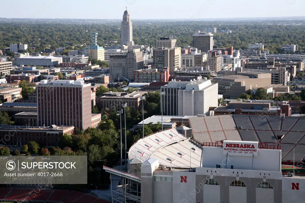 Memorial Stadium of University Of Nebraska with the downtown skyline in the background, Lincoln, Lancaster County, Nebraska, USA