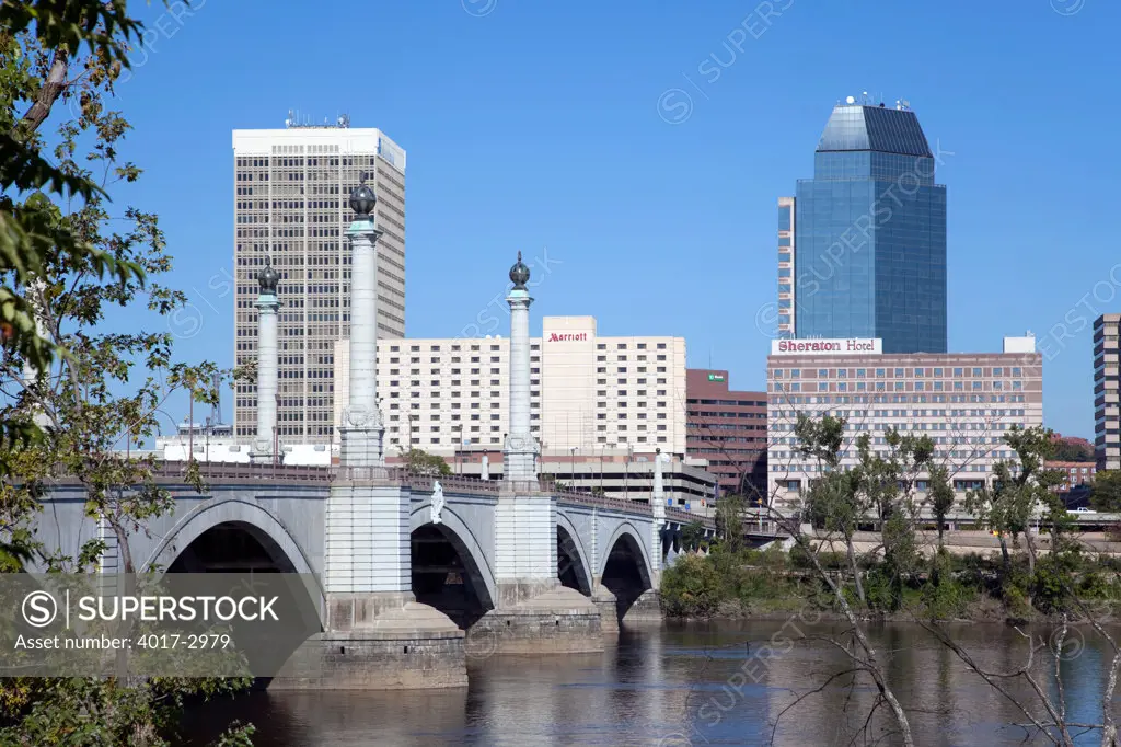 Downtown skyline of Springfield, Massachusetts from across the Connecticut River with the Springfield Memorial Bridge, USA