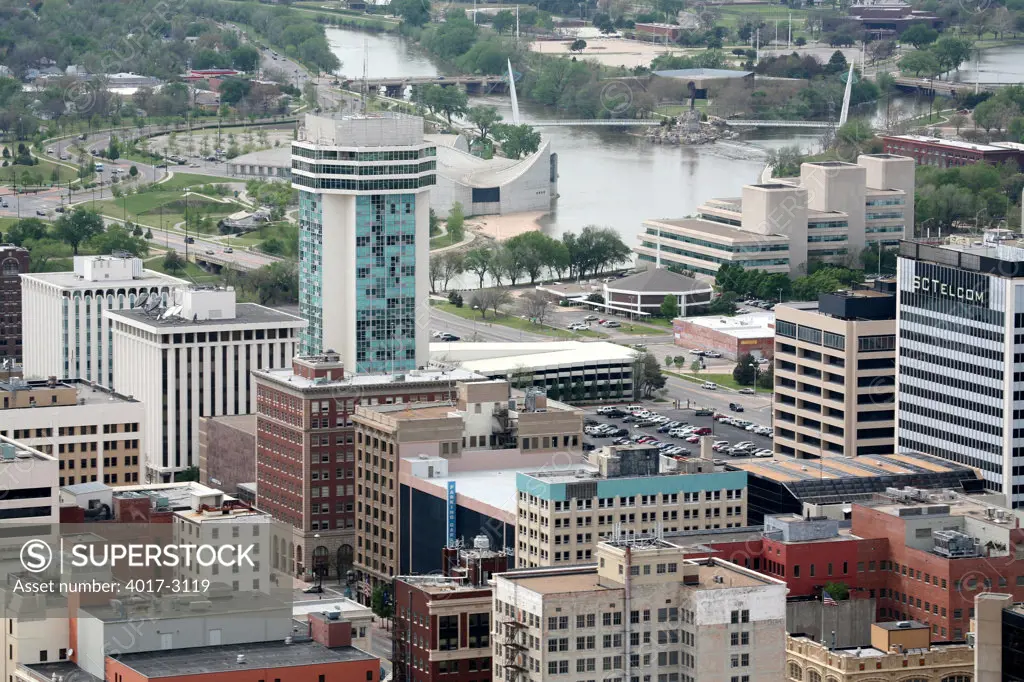 Aerial view of buildings with the Arkansas River in the background, Wichita, Kansas, USA