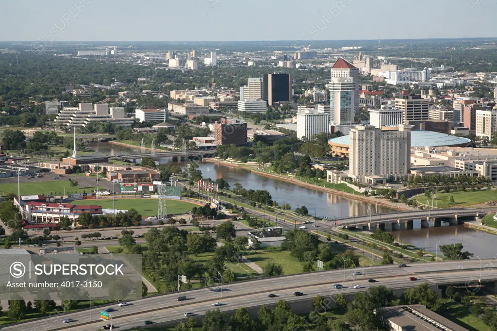 Aerial view of buildings in a city, Century II Convention Hall, Arkansas River, Wichita, Kansas, USA