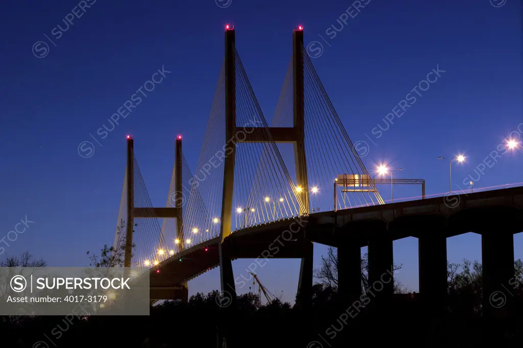 USA, Georgia, Savannah, Talmadge Memorial Bridge over Savannah River at dusk