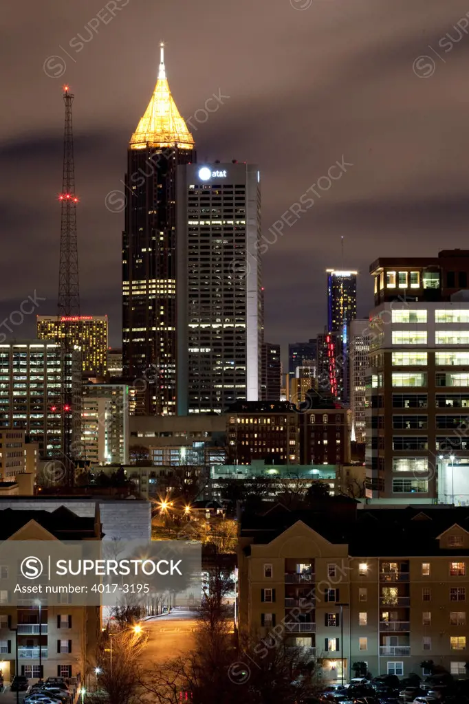 Midtown Atlanta skyline at night with downtown in the distance, Atlanta, Georgia, USA