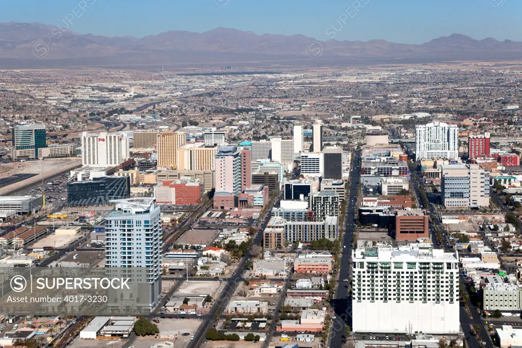 Aerial view of the Downtown Las Vegas skyline with mountains in the background, Las Vegas, Clark County, Nevada, USA