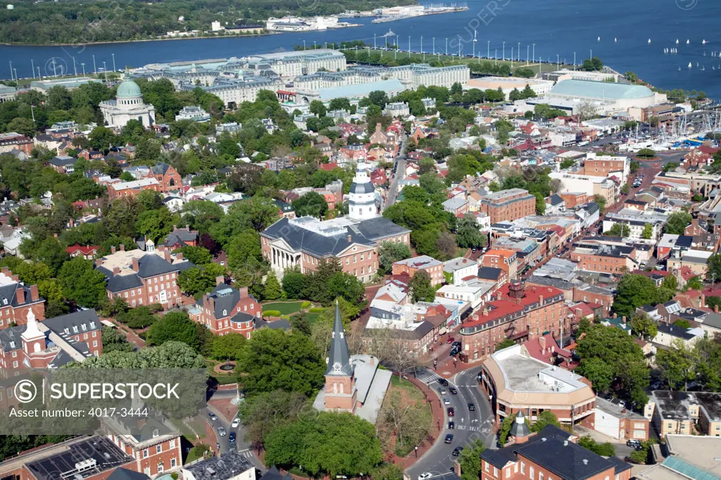 Aerial of the Colonial Annapolis Historic District near the State House of Maryland with the Naval Academy in distance