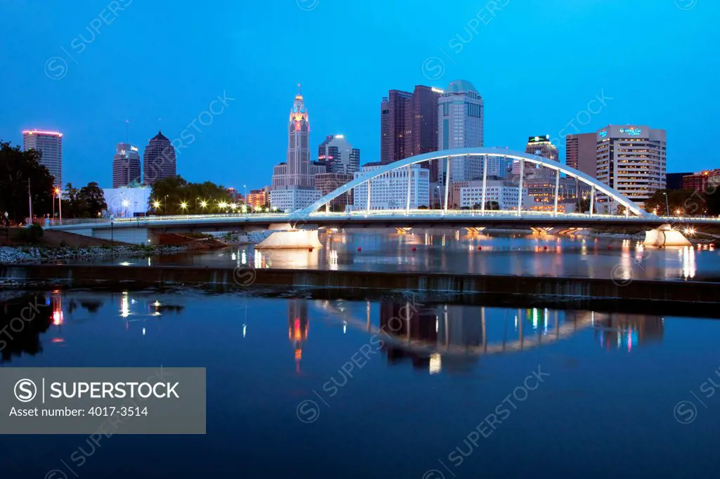 Downtown Skyline of Columbus, Ohio with the Main Street  Bridge over the Scioto River in the foreground