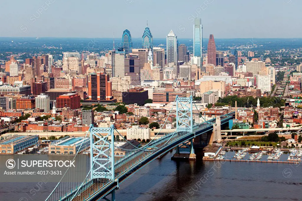 Philadelphia, Pennsylvania Skyline from over the Delaware River with the Benjamin Franklin Bridge in the Foreground
