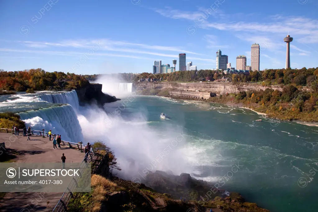 American Falls with Canadian Falls and Niagara Falls, ON skyline in background