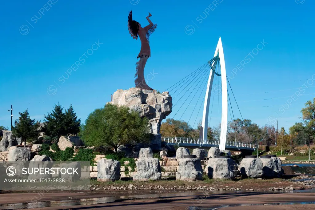 USA, Kansas, Wichita, Keeper of Plains sculpture and Arkansas River Pedestrian Bridges