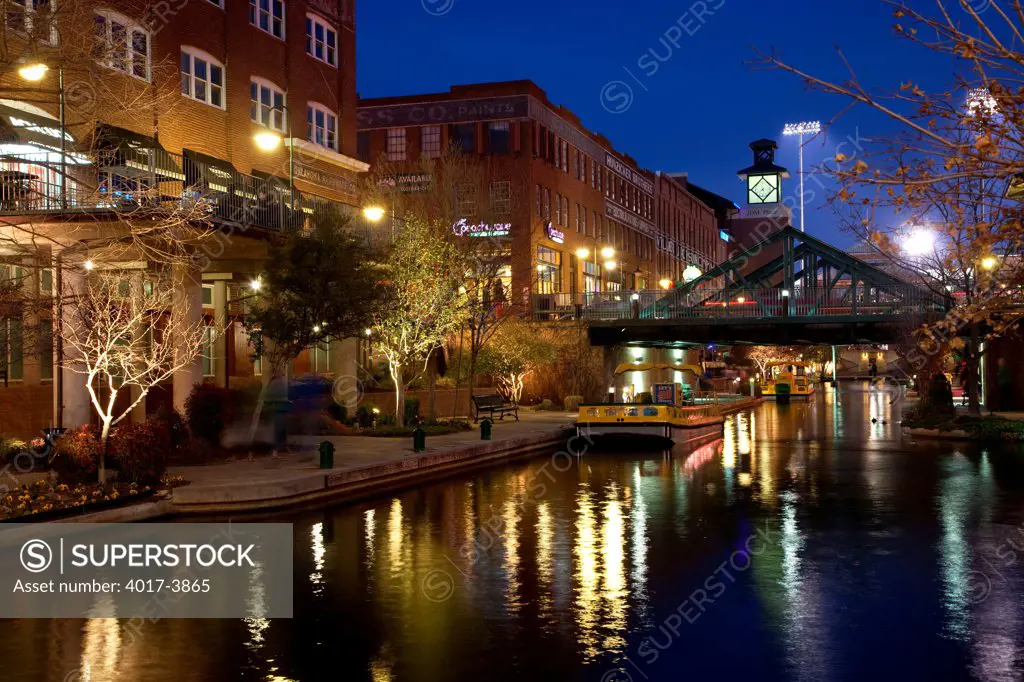 USA, Oklahoma, Oklahoma City, River Walk along Bricktown Canal at dusk