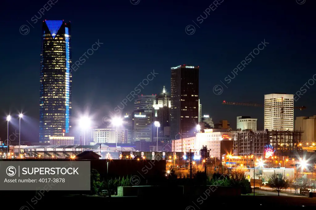 USA, Oklahoma, Oklahoma City, Downtown Oklahoma City skyline and ballpark at night