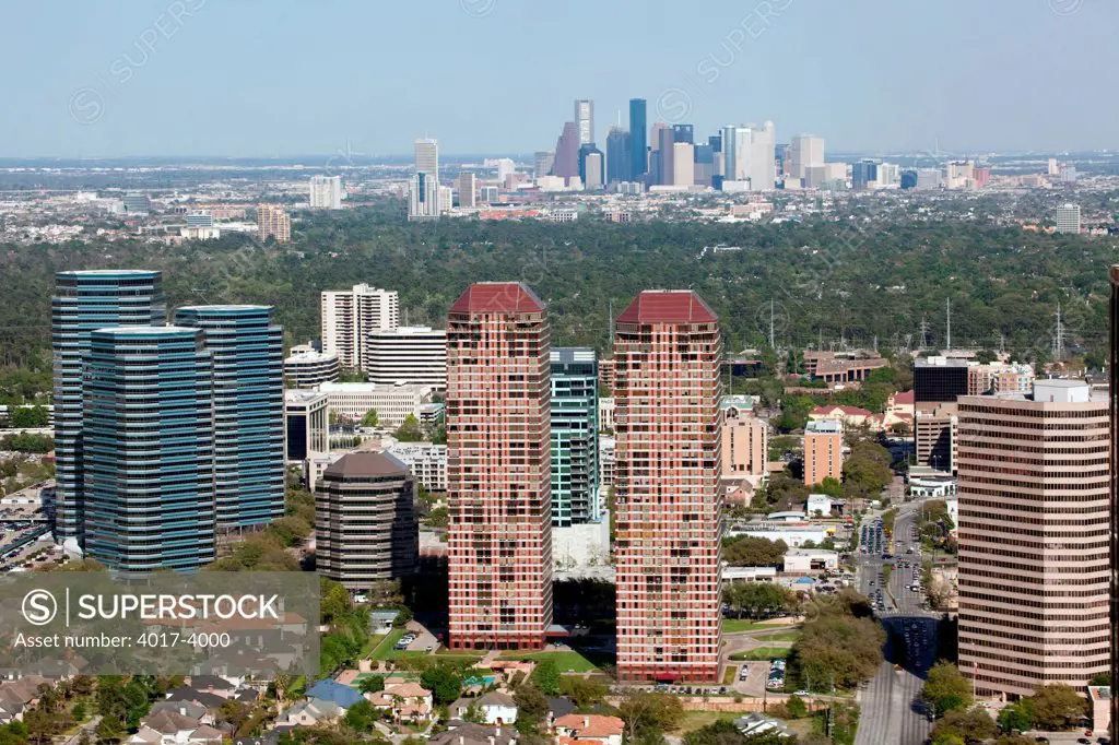 Aerial of Houston near Uptown with Downtown in the distance
