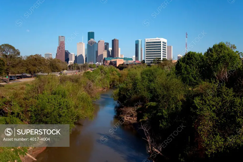 Skyline of Houston Texas behind the greenway of the Buffalo Bayou park system