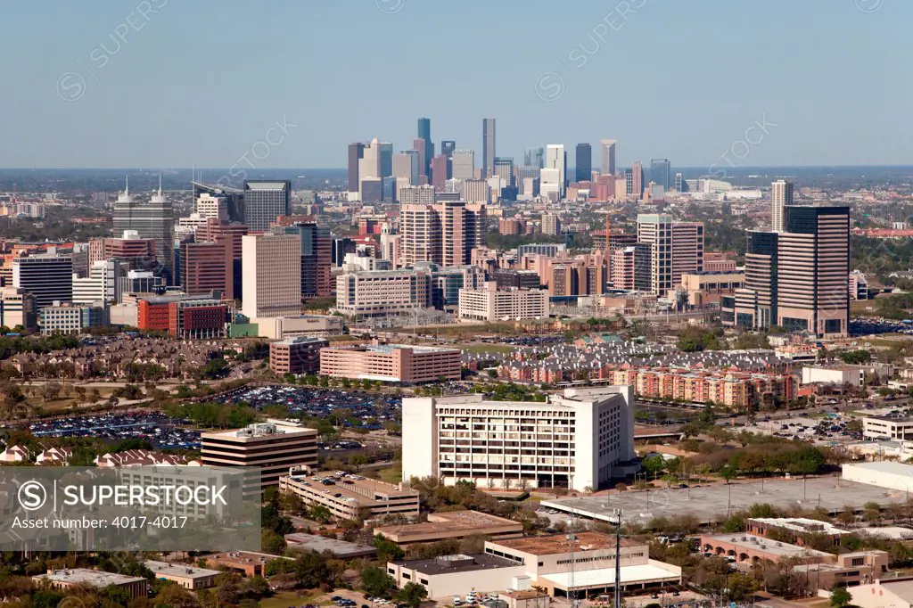 Aerial of the Texas Medical Center district with Downtown Houston in distance