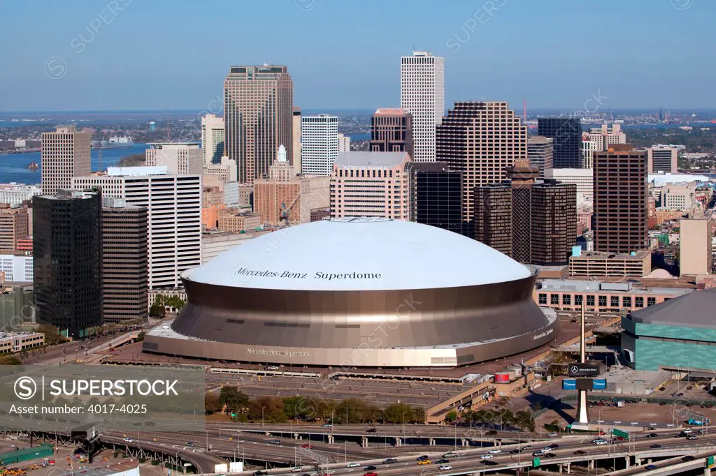Aerial of Downtown New Orleans, Louisiana with the Mercedes-Benz Superdome in the Foreground