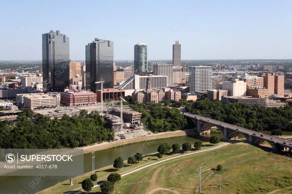 aerial of the Heritage Park Plaza along the  Trinity River with the Fort Worth skyline