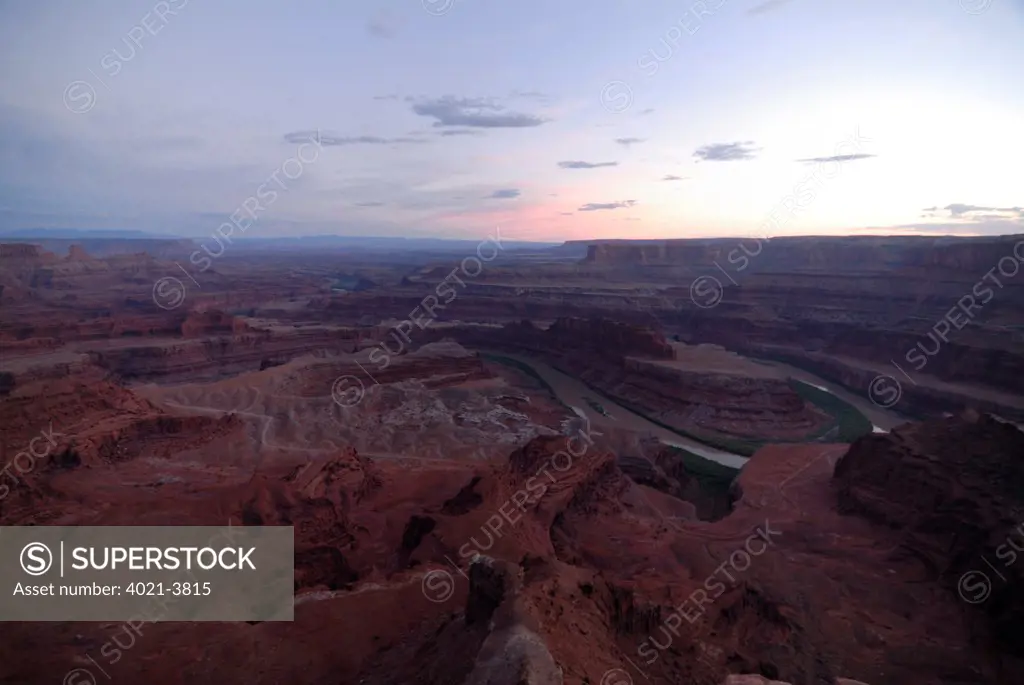 Rock formations and Colorado River at dusk, Dead Horse state park, Moab, Utah, USA