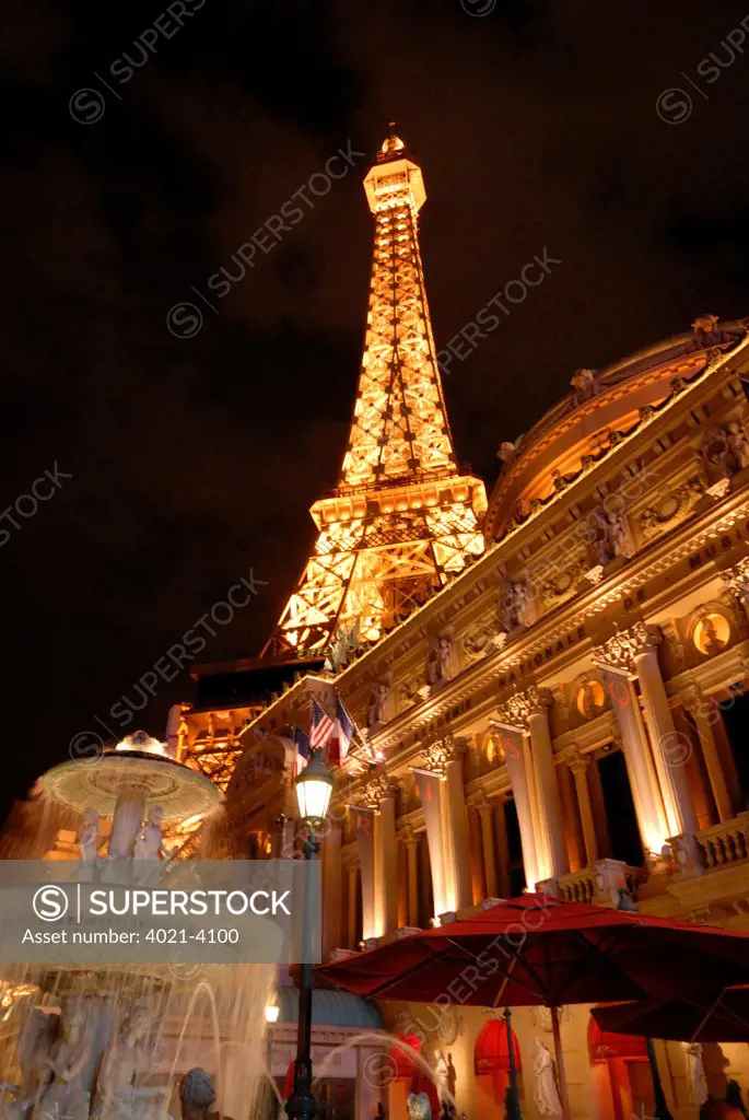 Paris Las Vegas and Replica Eiffel Tower lit up at night, Las Vegas, Nevada, USA