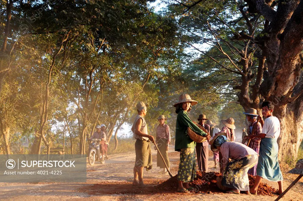 Workers at the construction site of a dirt road, Pyay, Bago Region, Myanmar