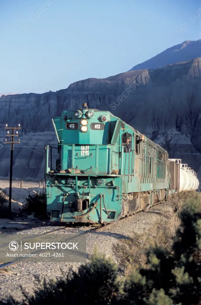 Freight train on track in the Atacama Desert near Salta, Argentina